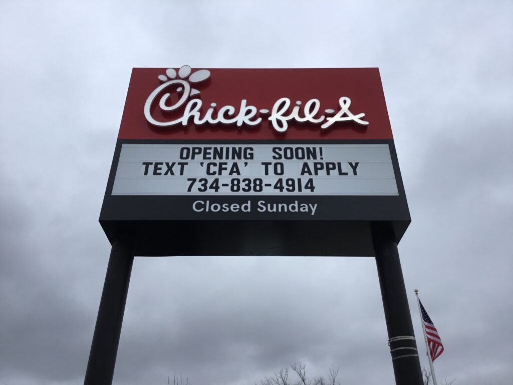 Chick-Fil-A pylon sign in Monroe, MI