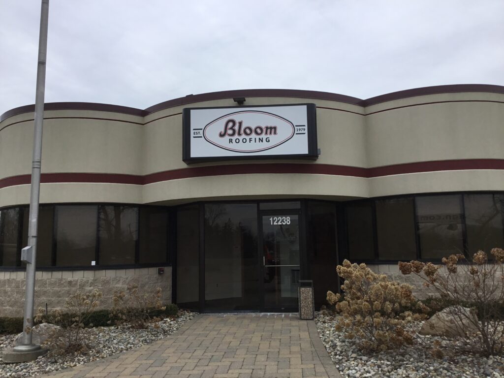 Bloom Roofing wall sign in Brighton, MI