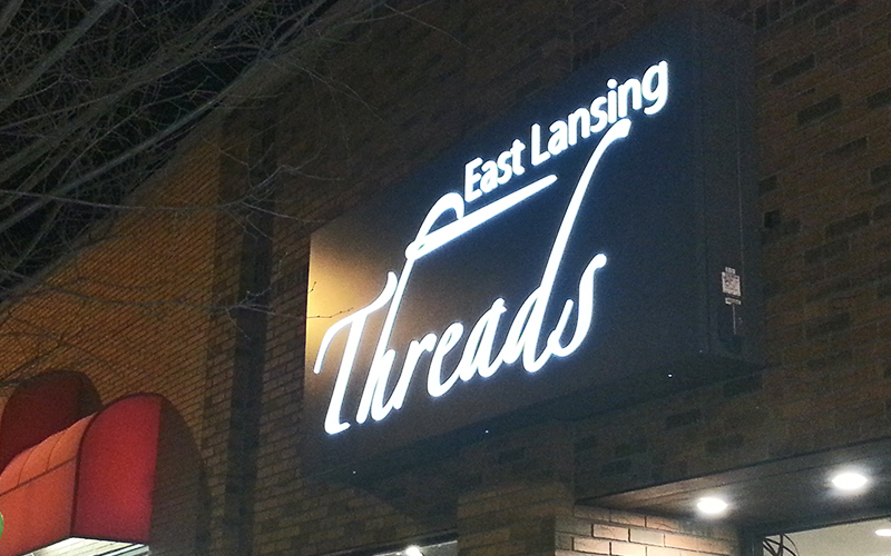 Threads wall sign in East Lansing, MI