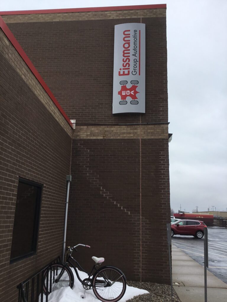 Eissmann Automotive Group wall sign in Port Huron, MI