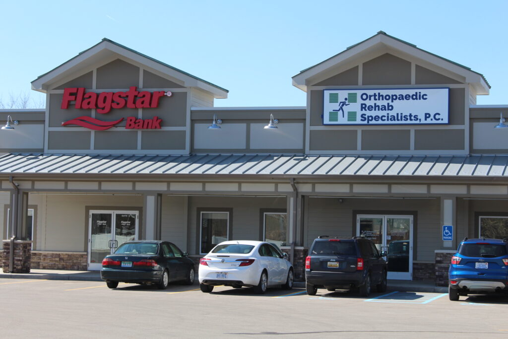 Flagstar and Orthopaedic Rehab wall signs in Napoleon, MI