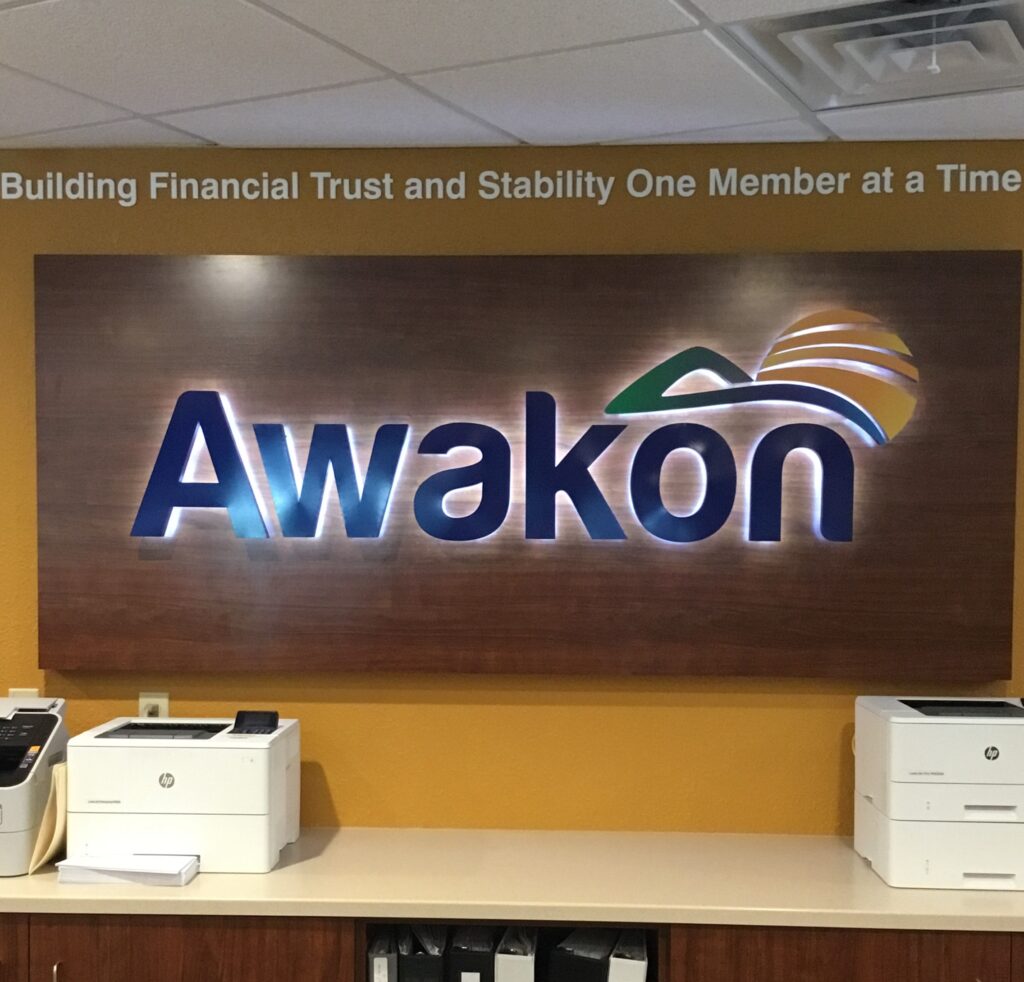 Awakon Federal Credit Union interior sign in Onaway, MI