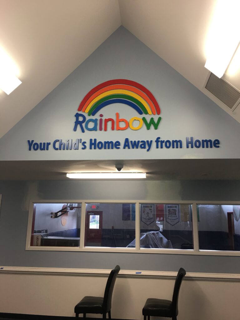 Rainbow Child Care Center interior sign in Zionsville, IN