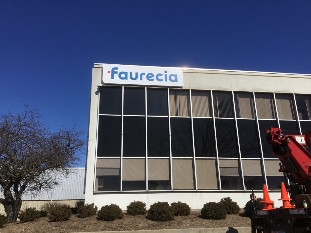 Faurecia Interior Systems wall sign in Saline, MI