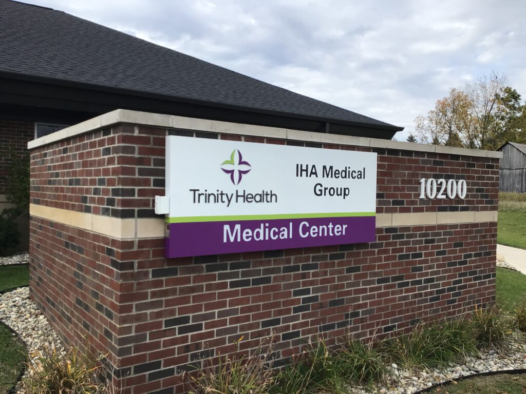 Trinity Health IHA wall sign in Pinckney, MI