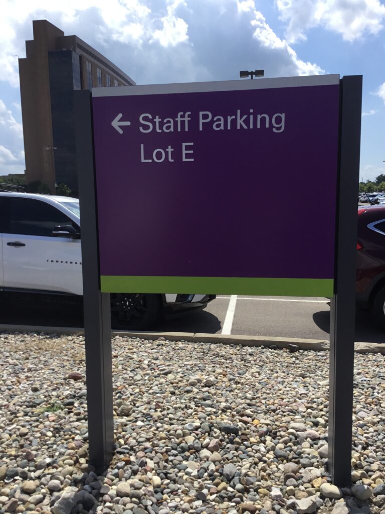 Trinity Health directional staff parking sign in Ann Arbor, MI