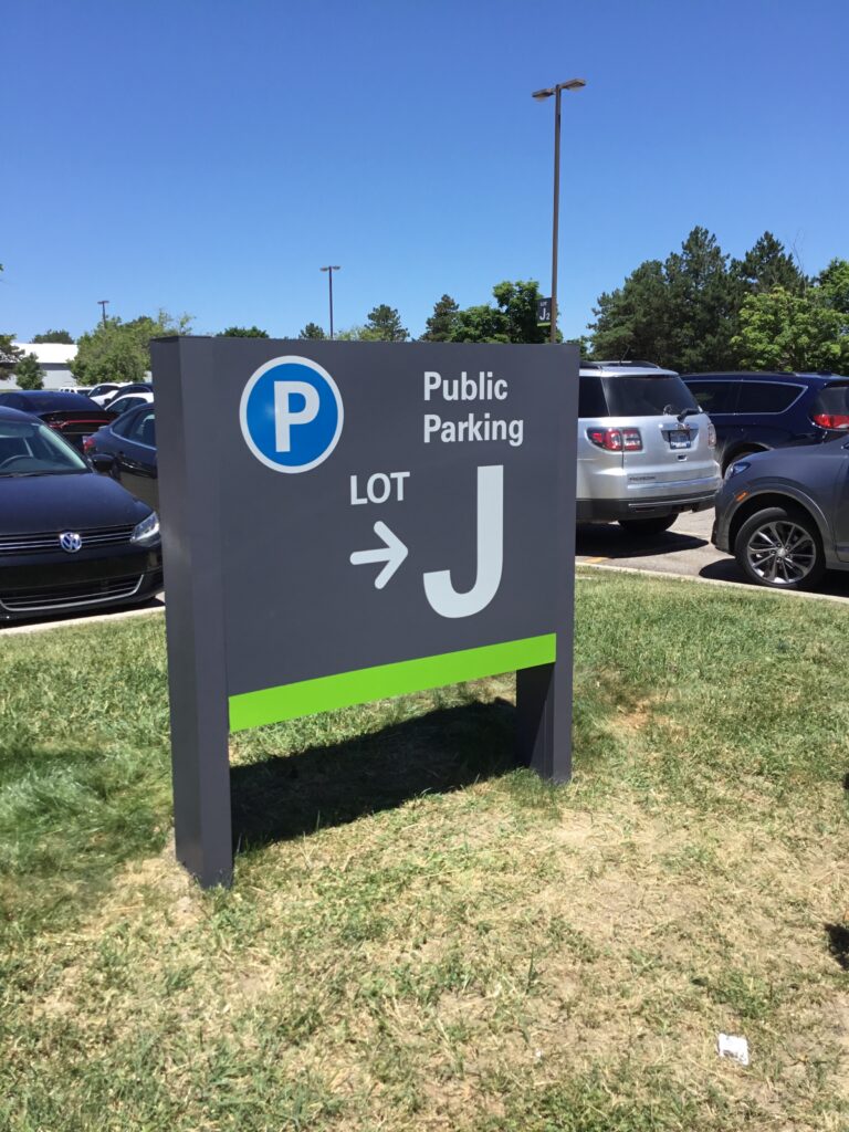 Trinity Health directional public parking sign in Ann Arbor, MI