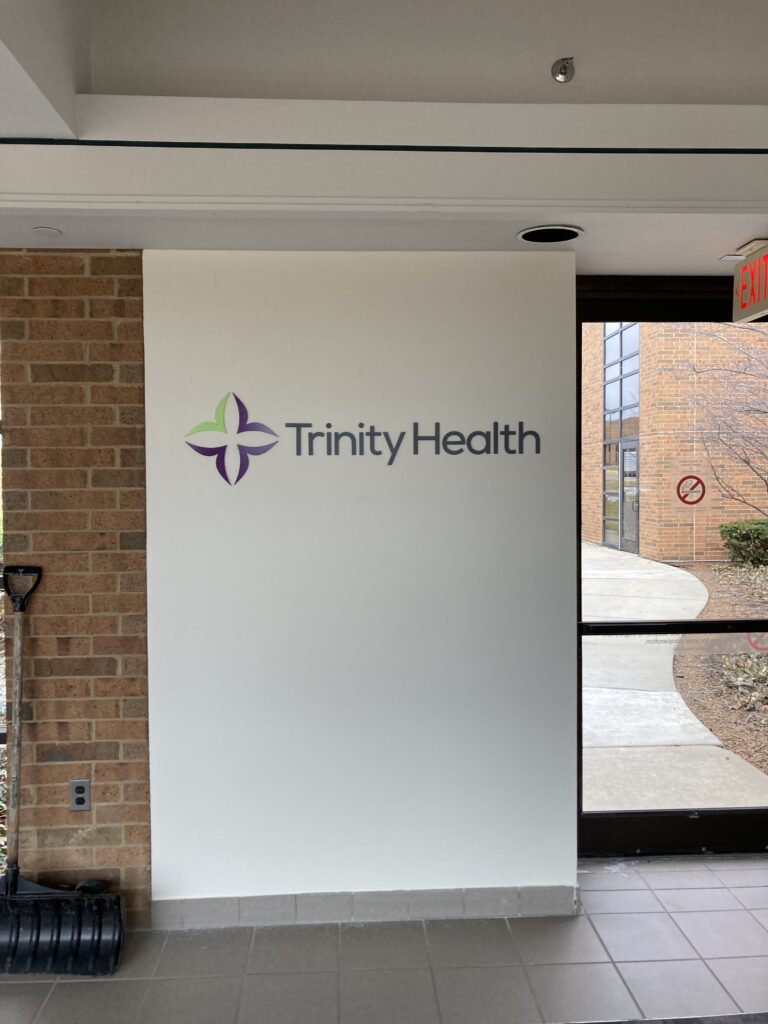 Trinity Health mercy hospital interior sign in Ypsilanti, MI