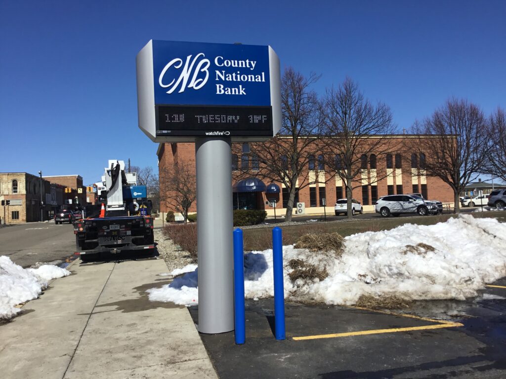 County National Bank pylon sign with electronic message center in Hillsdale, MI