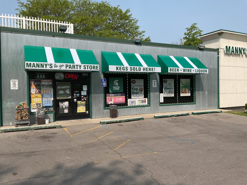 Manny's Party Store awnings and wall letters in East Lansing, MI